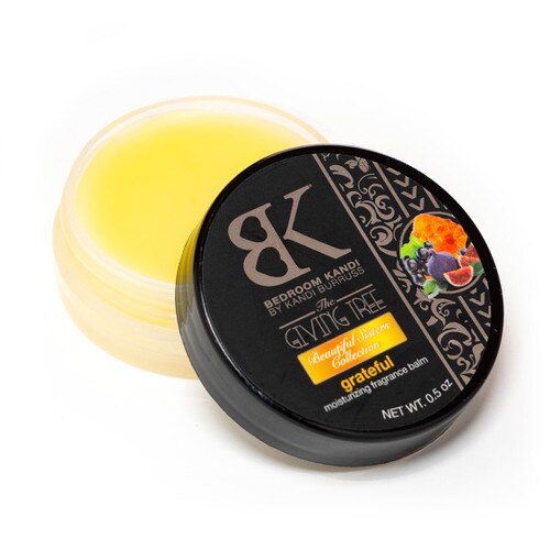 An open moisturizing perfume balm in the Giving Tree's Grateful fragrance
